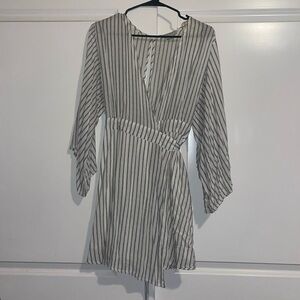 White/ black striped wrap dress. Flowey Long sleeve